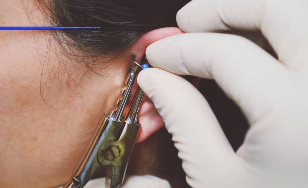 ear being pierced