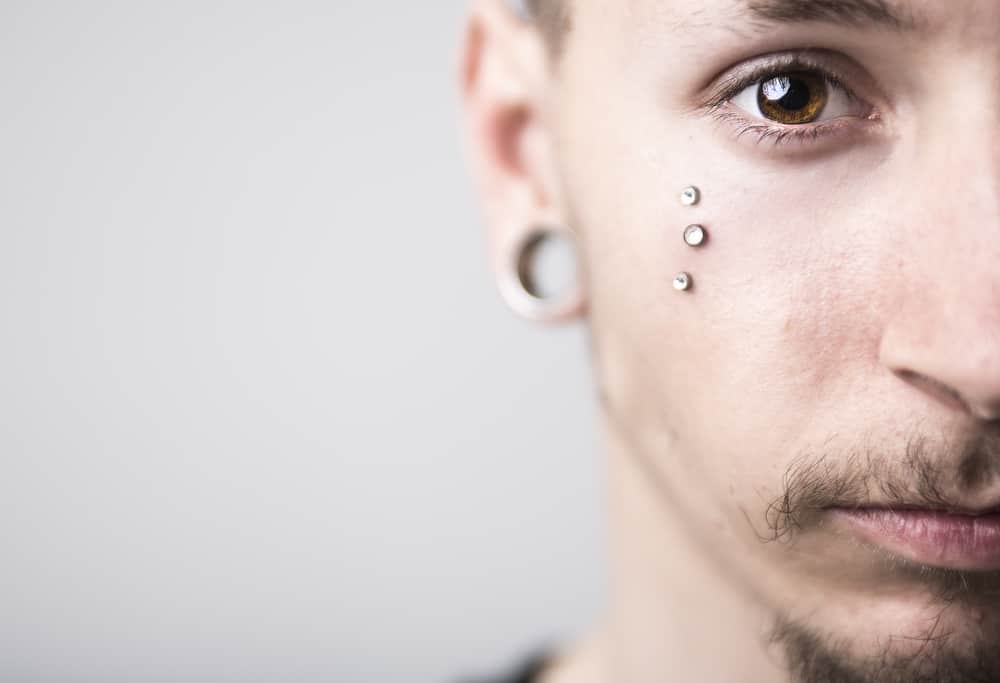 man with pierced face