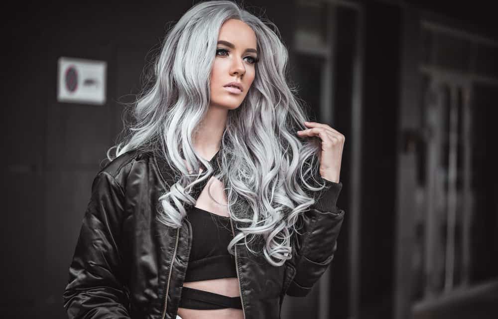 cool woman with grey hair and leather jacket