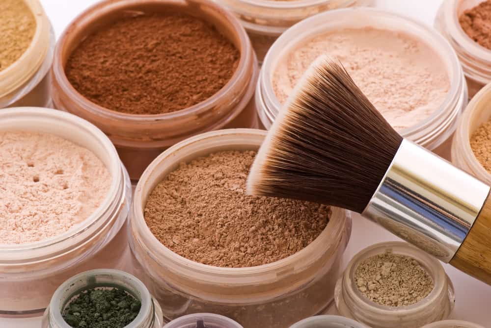 mineral makeup pots with a kabuki brush