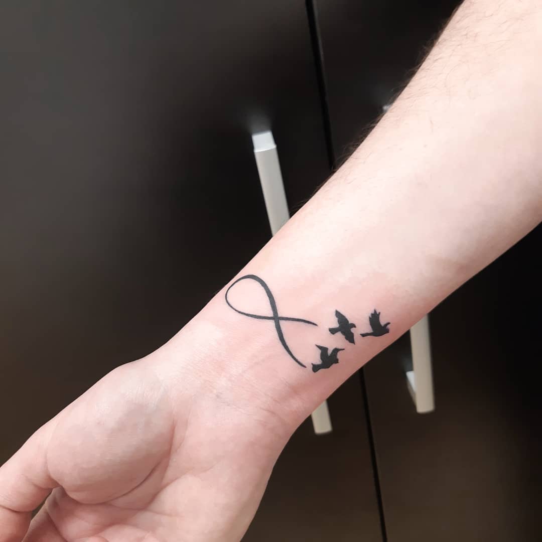 Infinity Tattoo With Birds Meaning