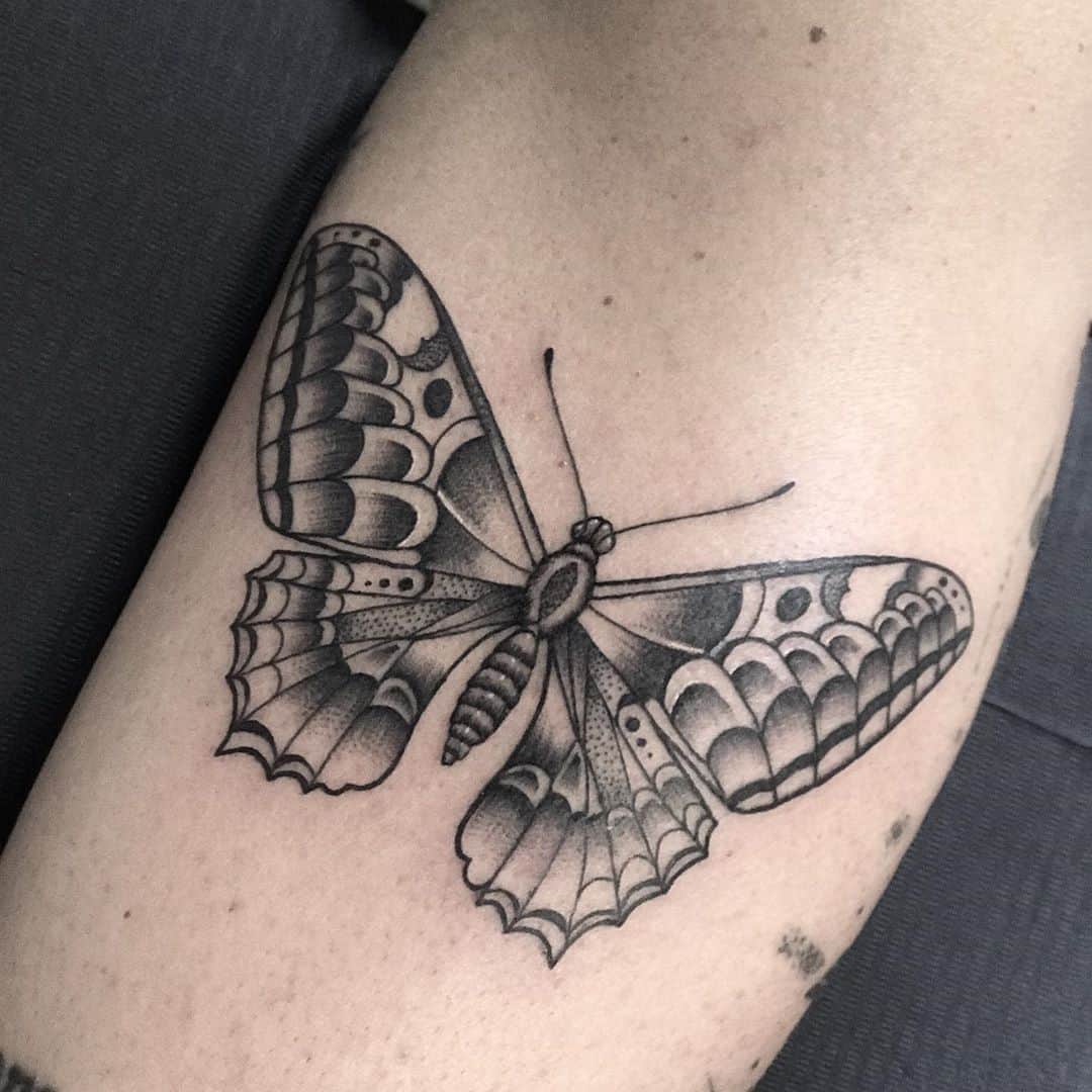 Small Pink Shaded Butterfly Tattoo On Back