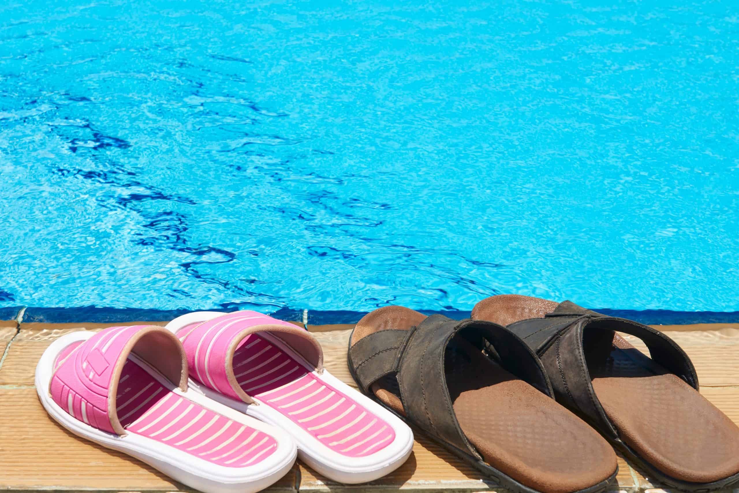 slides shoes by the pool