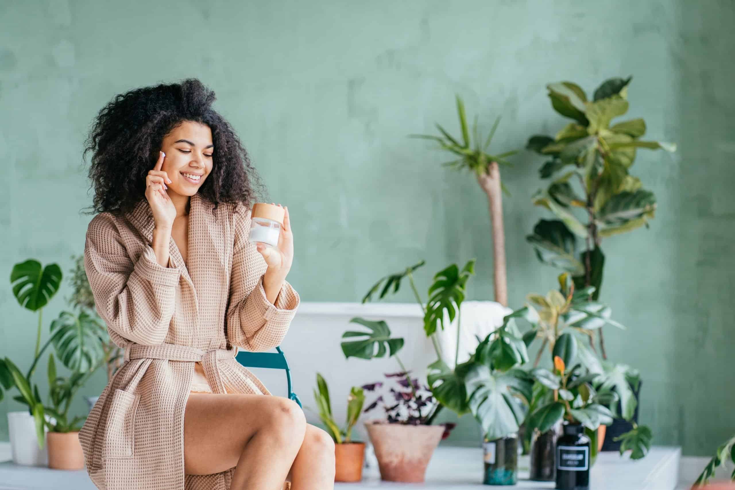 smiling woman enjoying skin care