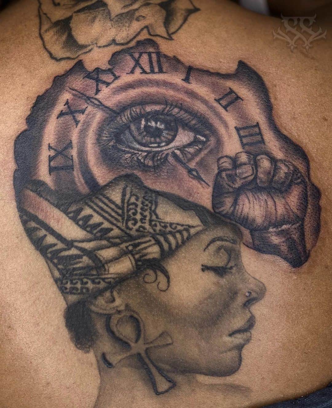 11. African Queen With Clock, Eye, and Ankh.