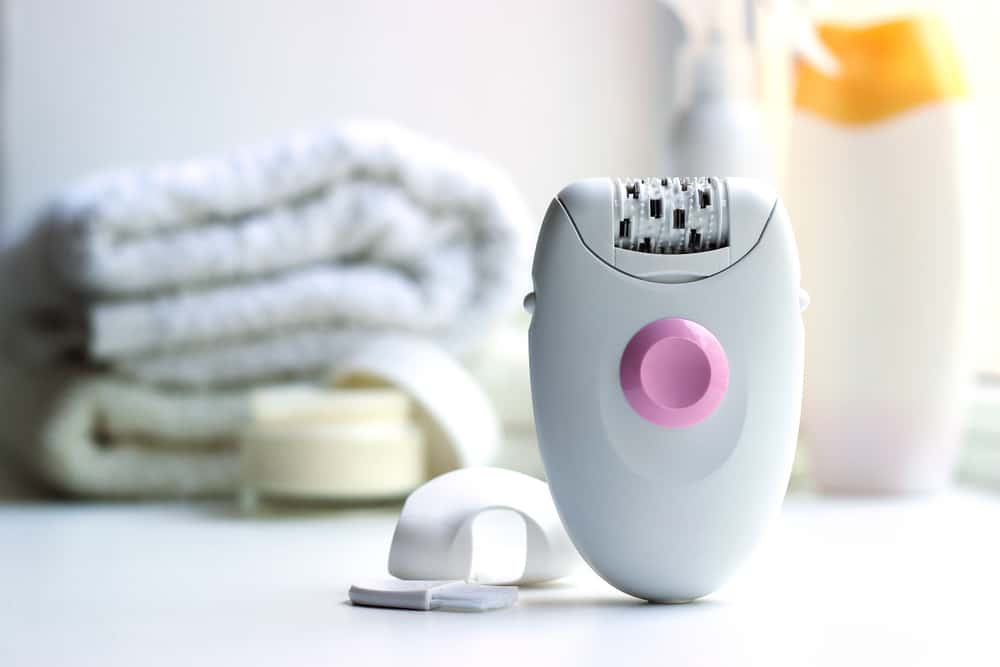 close up of pink and white epilator