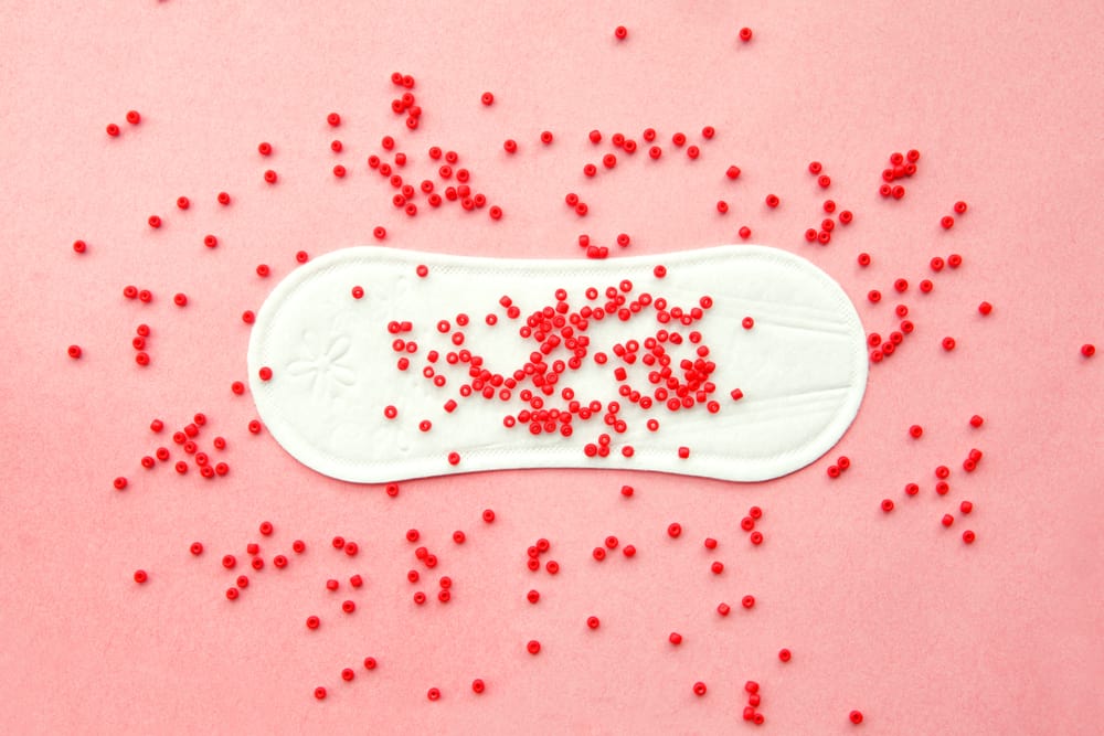 menstruation pads with red beads