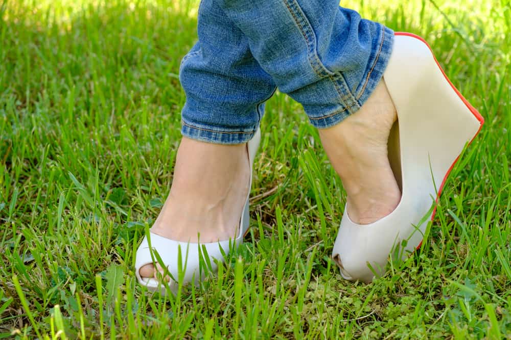 woman wearing wedge heels