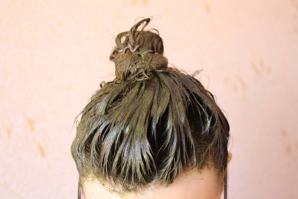 green henna paste on hair