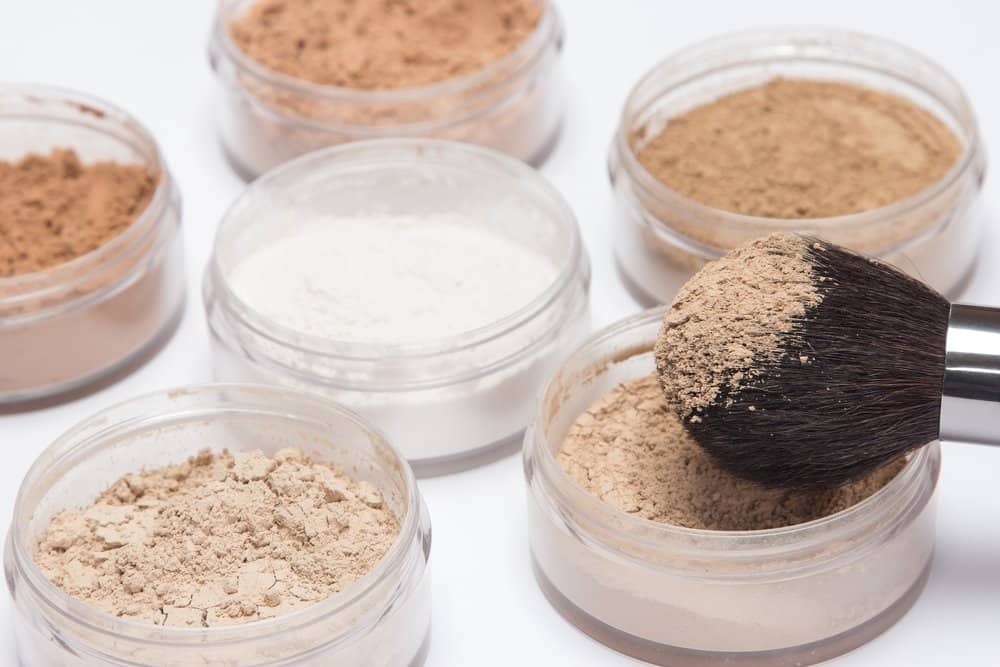 open jars of translucent powder