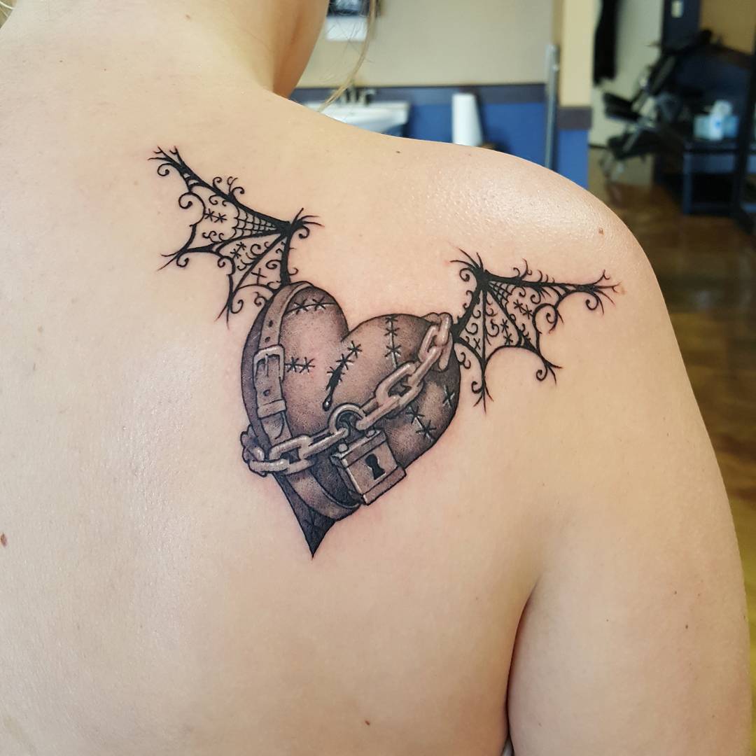 tatt of broken heart with heartbeat line