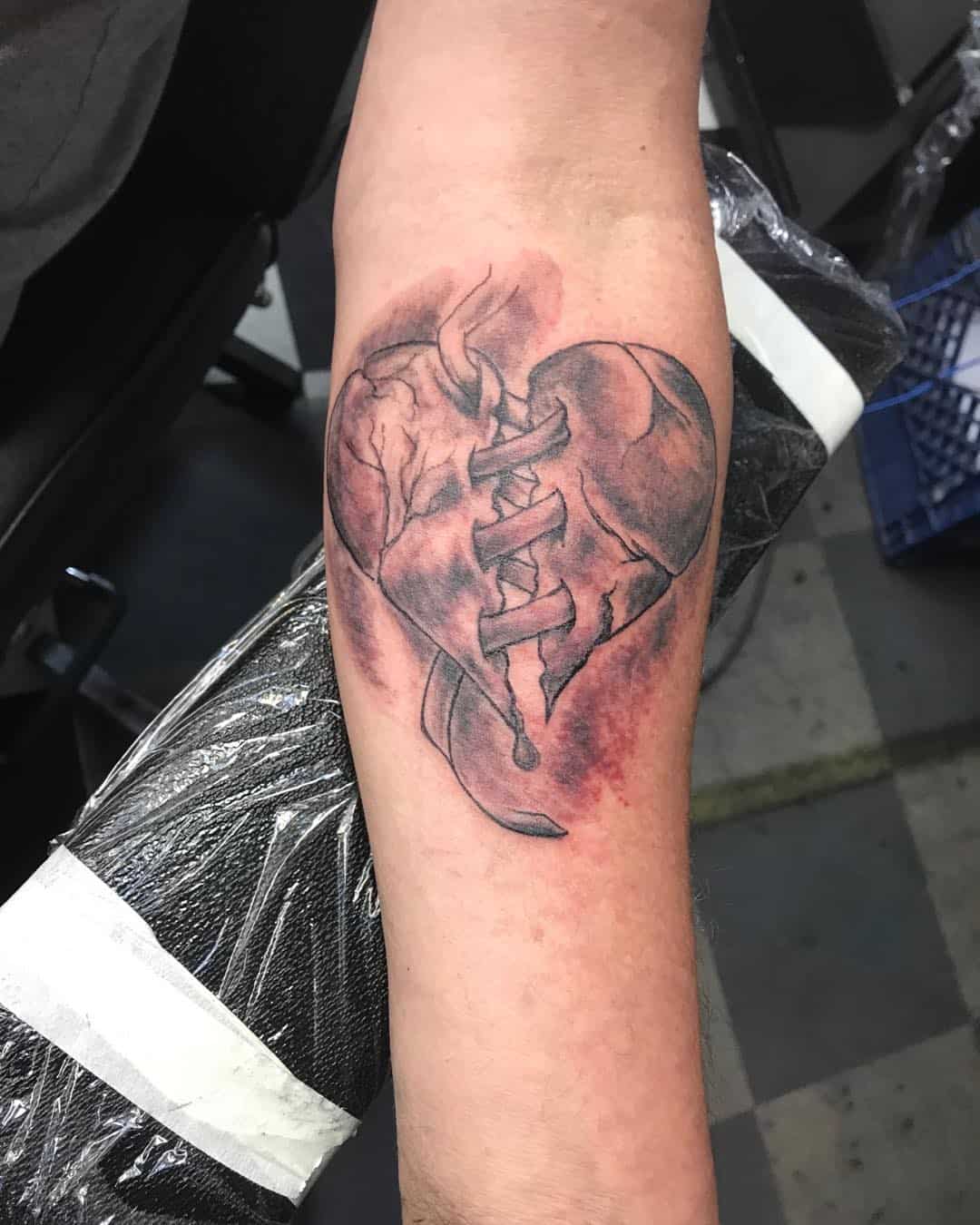 Aggregate 70+ stitched up heart tattoo best - in.cdgdbentre