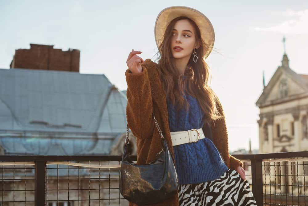 woman with black hobo bag