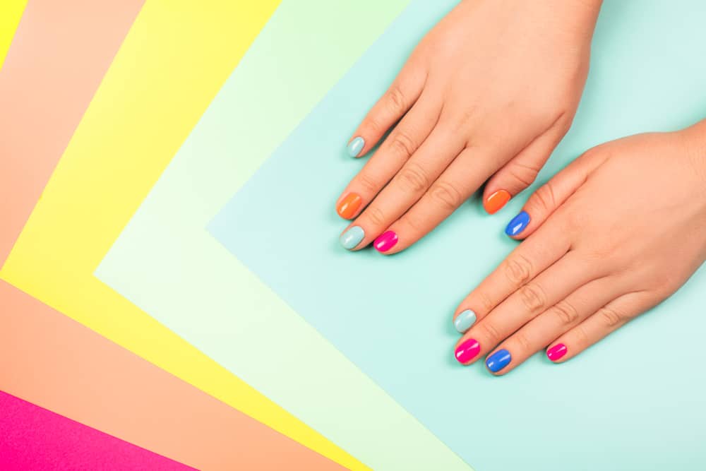 hands with bright manicure