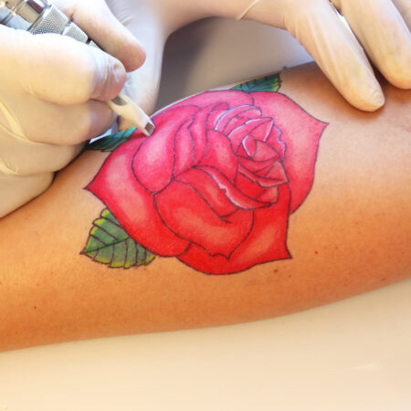 The History and Meaning of the Rose Tattoo