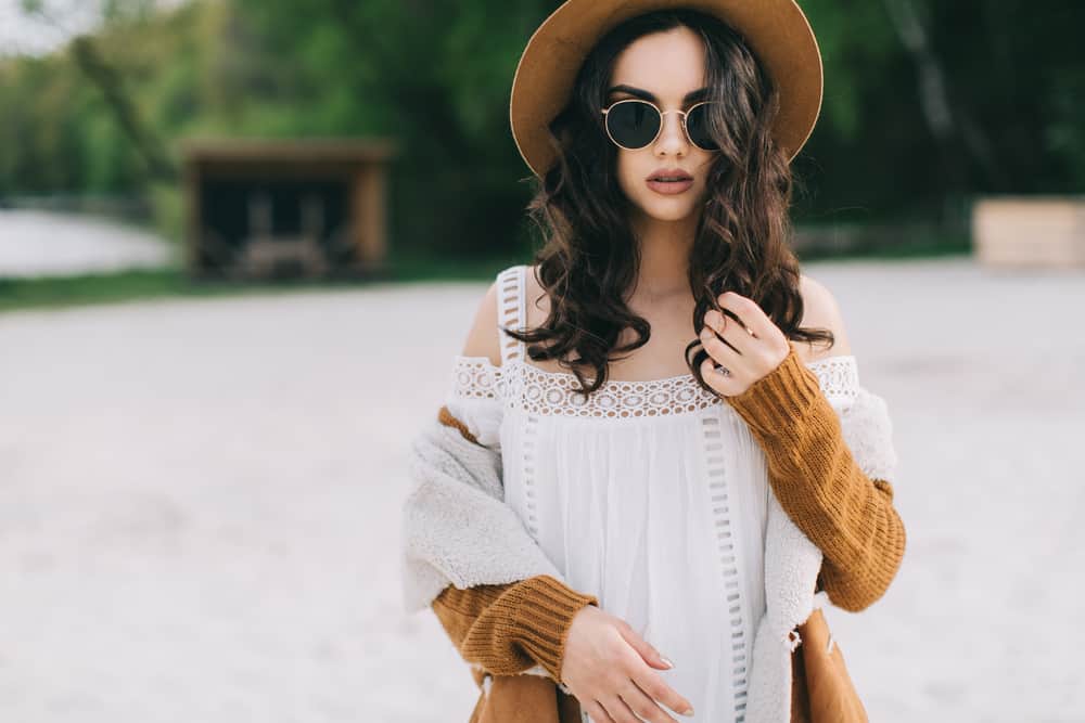 hippie girl in sunglasses and hat