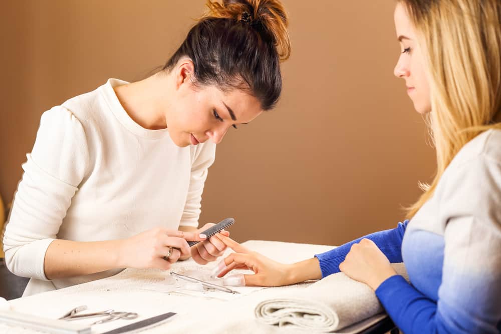 nail technician at work