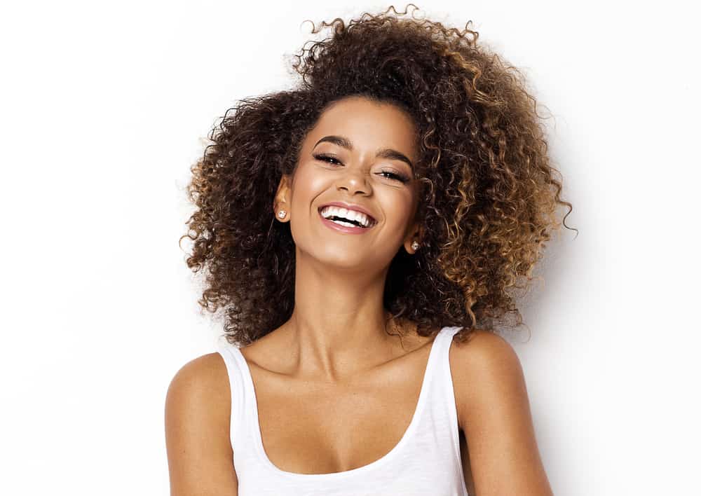 smiling young woman with curly hairstyle