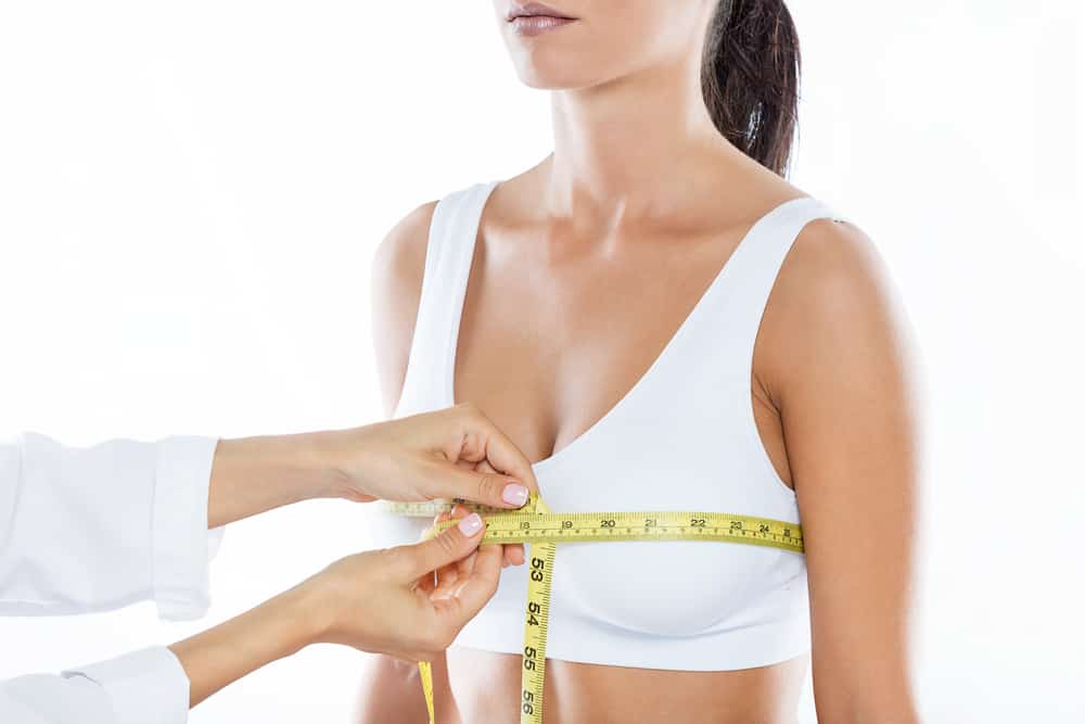 woman being measured for bra