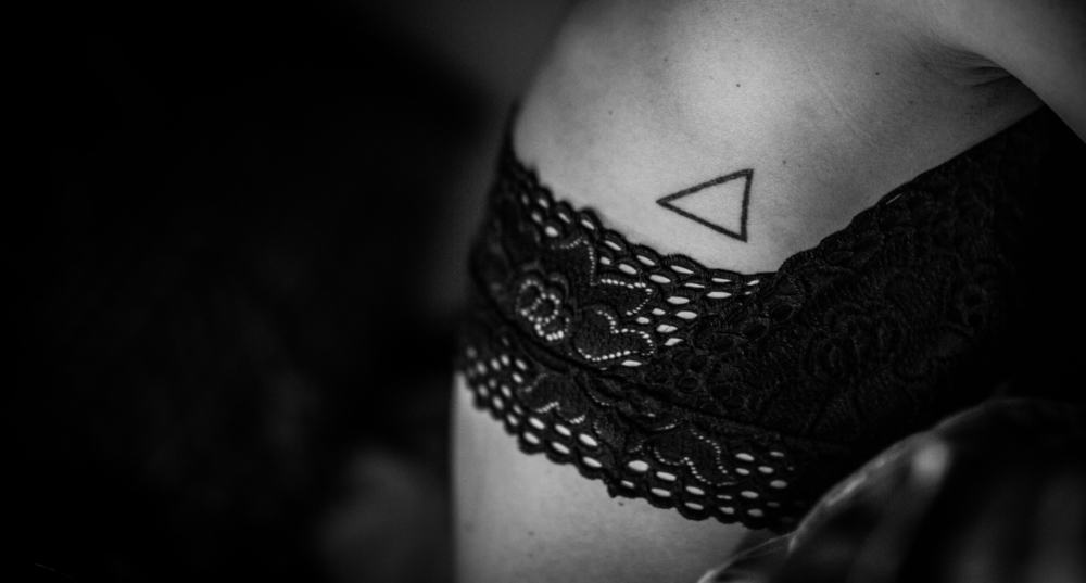 What Do Triangle Tattoos Mean Symbolize Beauty Mag