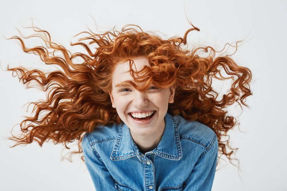 red-haired girl with curls