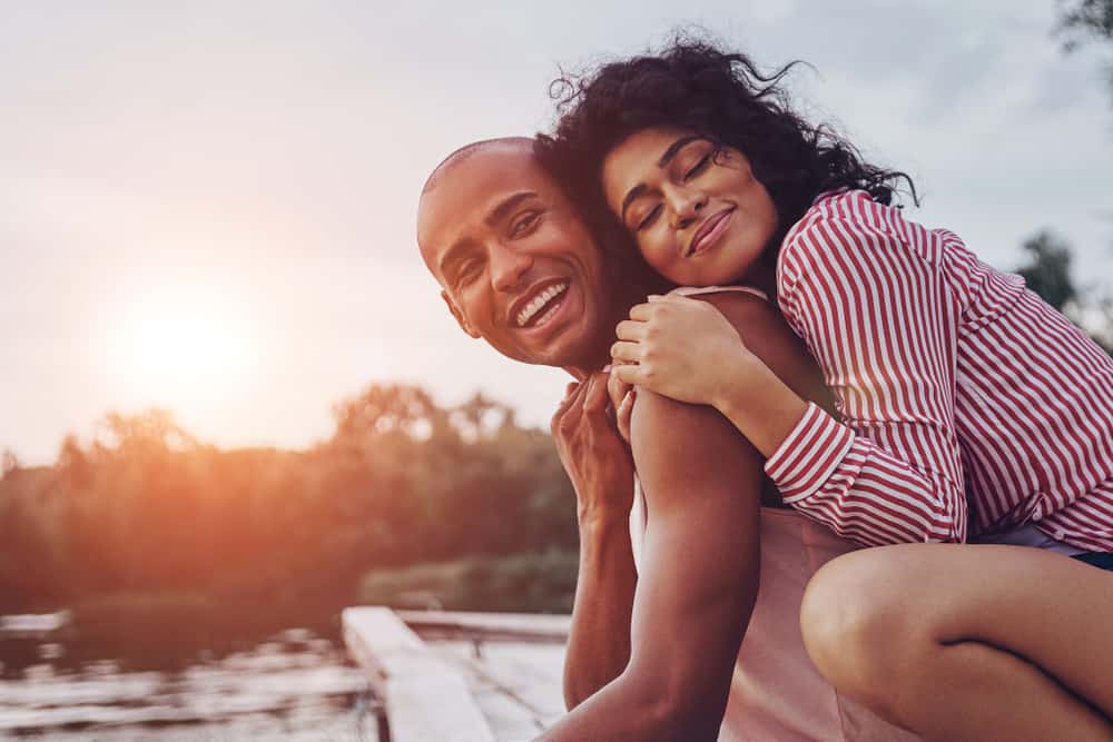 couple hugging outdoors