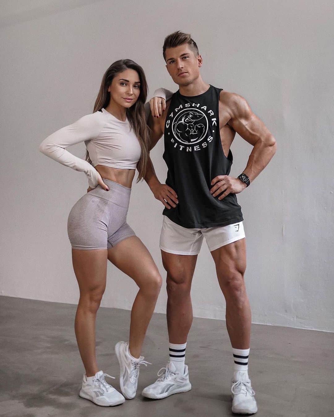 fit couple in gym clothes