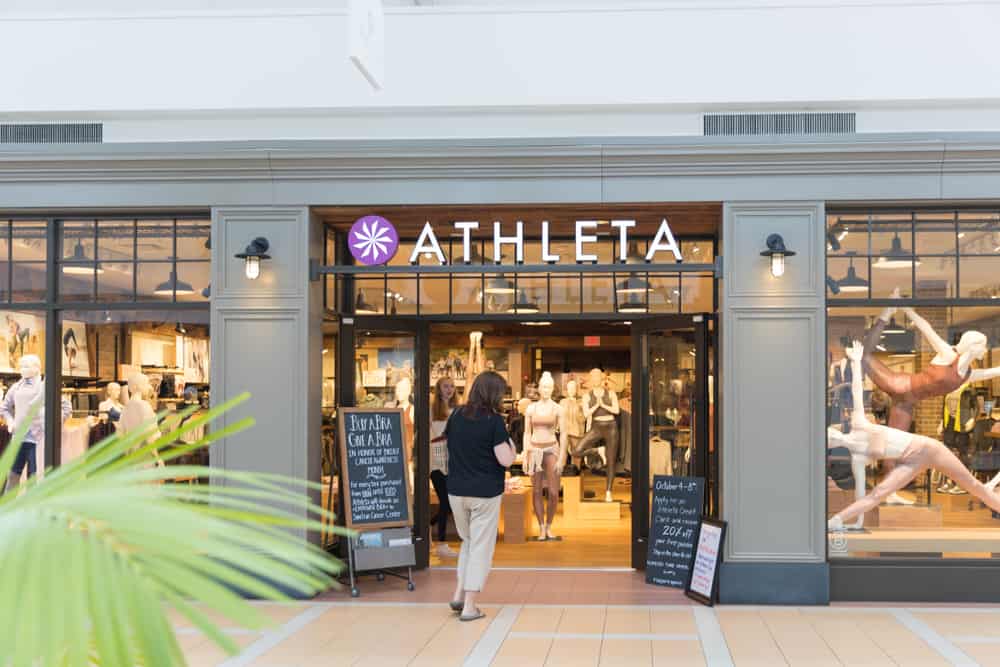 woman entering athleta store