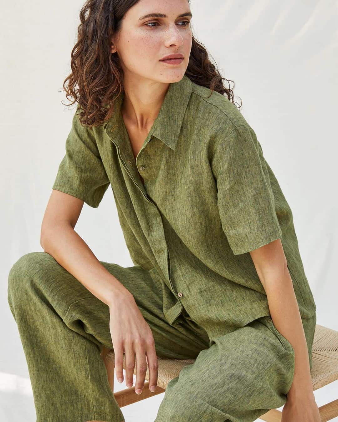 woman in linen shirt and pants