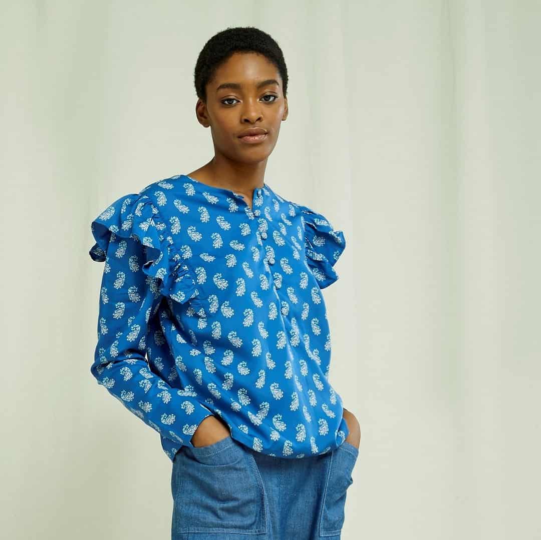 woman in printed ruffled blouse