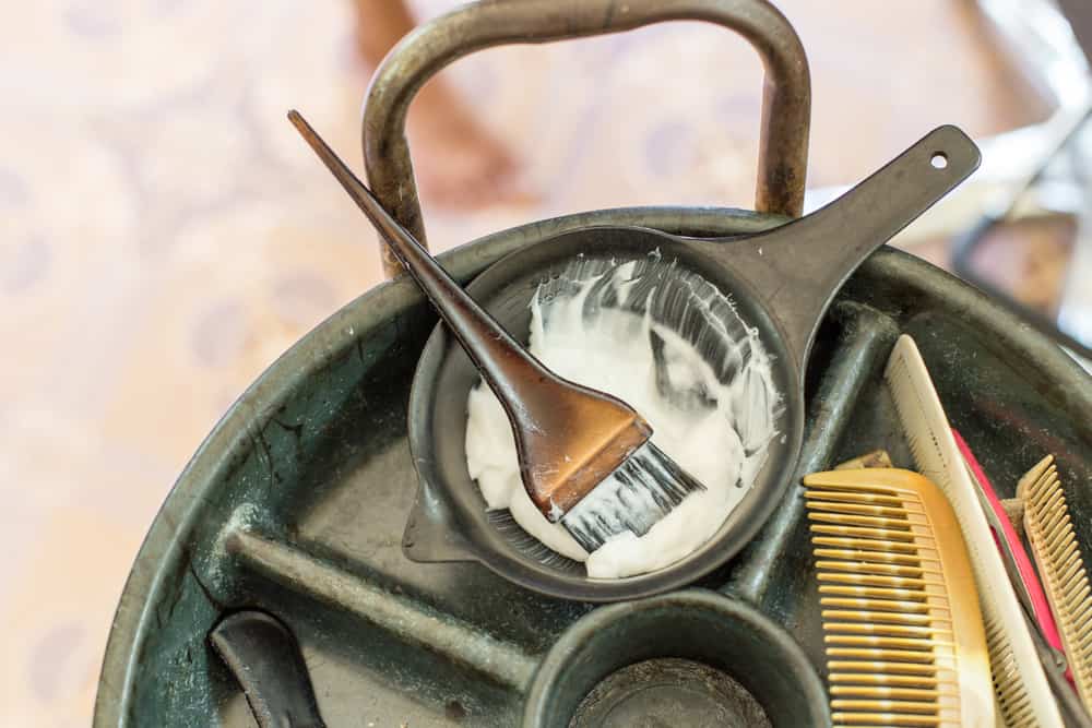 bowl of bleach with tools