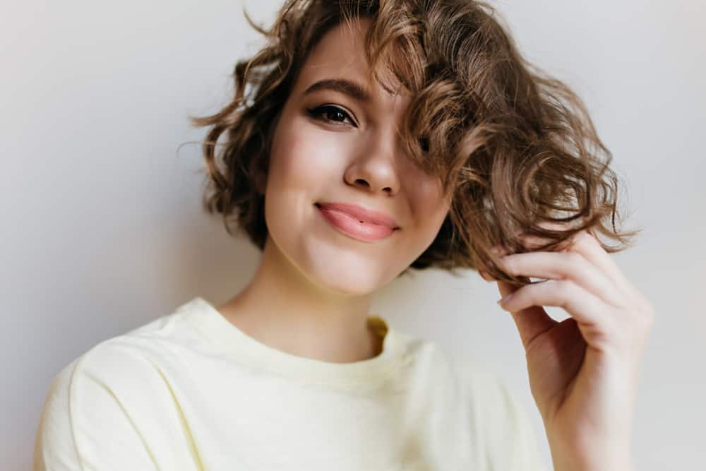 woman with short curly hair