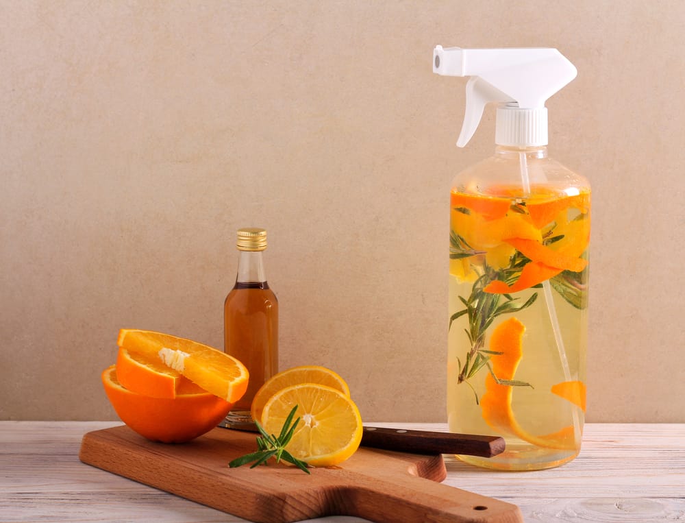 natural spray next to oranges