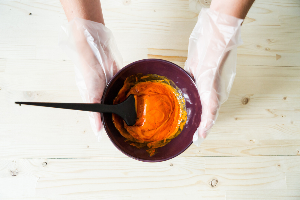 a bowl of orange dye